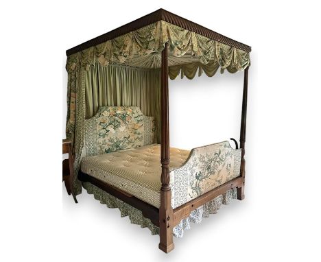 A George III style mahogany four poster bedstead, 154cm wide, 194cm deep, 218cm high PLEASE NOTE:- Prospective buyers are str