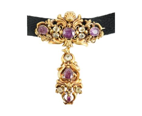 A Victorian yellow metal, garnet and chrysoberyl cluster set drop brooch, 56mm, on a black sash necklet, gross weight 9.6 gra