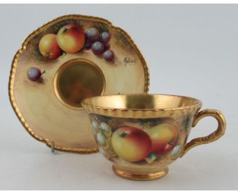 A Royal Worcester tea cup and saucer, decorated with fruit by Roberts&nbsp;Condition Report:  Good condition, no chips, crack