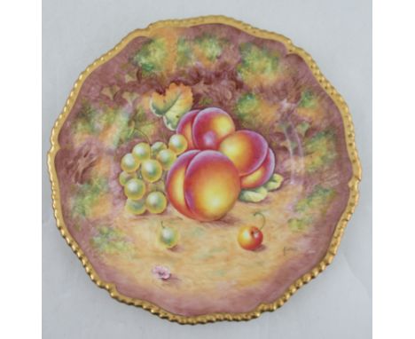 A Royal Worcester plate, decorated with fruit to a gadroon border by Lewis, diameter 10.5ins&nbsp;Condition Report:  Good con
