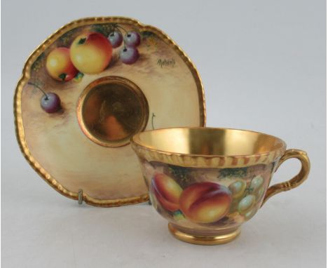 A Royal Worcester tea cup and saucer, decorated with fruit by Roberts&nbsp;Condition Report:  Good condition, no chips, crack
