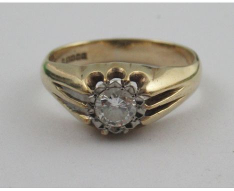 A 9ct single stone diamond ring, claw set round brilliant cut, estimated at 0.04ct&nbsp;