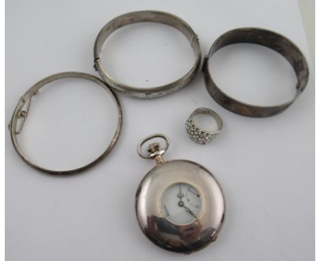 A silver cased half hunter pocket watch, the dial signed Habmann, together with three silver bangles and a ring set with whit