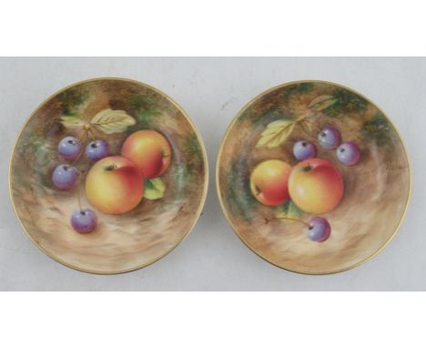 A pair of Royal Worcester pin dishes, decorated with fruit to a mossy background by Roberts, diameter 4.5insCondition Report: