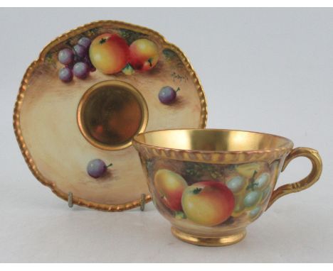 A Royal Worcester tea cup and saucer, decorated with fruit by Roberts&nbsp;Condition Report:  Good condition, no chips, crack