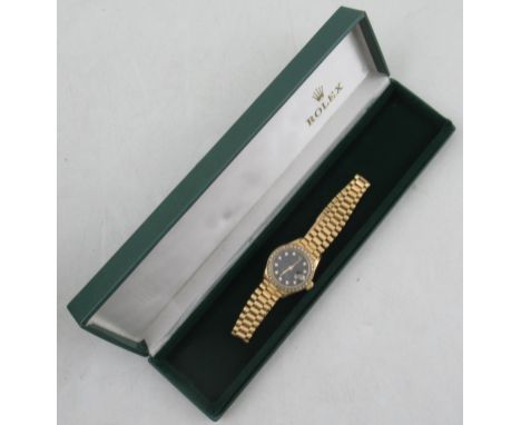 A Lady's 18ct gold Oyster Perpetual Date Just wrist watch superlative chronometer, set with diamonds to the black dial, date 