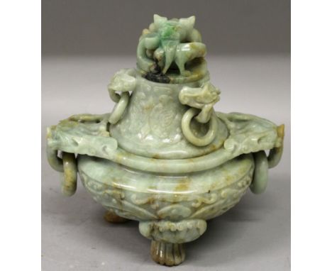 A GOOD EARLY 20TH CENTURY CHINESE CELADON JADE SECTIONAL TRIPOD CENSER, with detachable neck section and cover, the sides wit