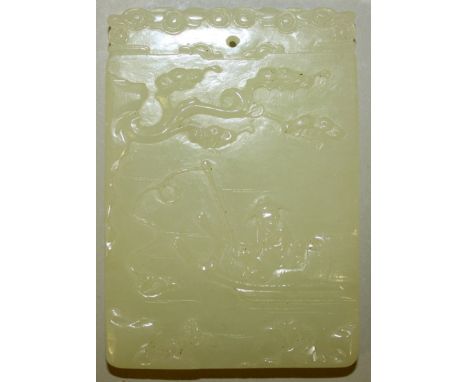 A CHINESE CELADON JADE-LIKE RECTANGULAR PENDANT, modelled in relief to one side with a fisherman in a river boat, the reverse