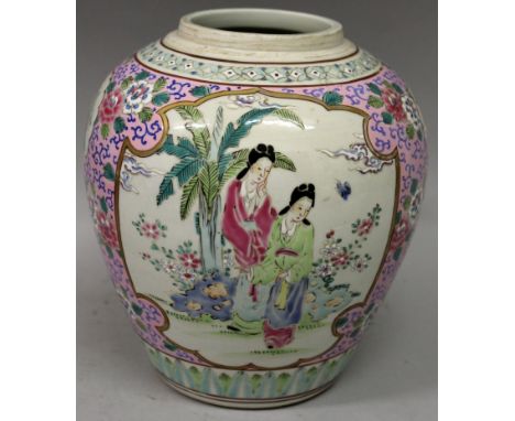 AN EARLY 20TH CENTURY JAPANESE ENAMELLED PORCELAIN JAR, painted with figural and foliate panels, the base with a maker's mark