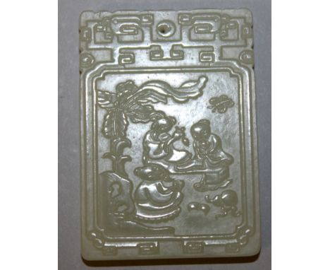 A CHINESE RECTANGULAR JADE PENDANT, decorated in low relief with a sage and boy attendants to one side and with foliage to th