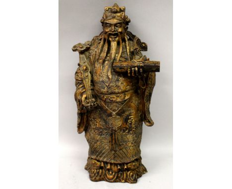 A CHINESE LACQUERED & GILT WOOD FIGURE OF AN EMPEROR, holding a scroll in one hand and a ruyi sceptre in the other, 14.25in h
