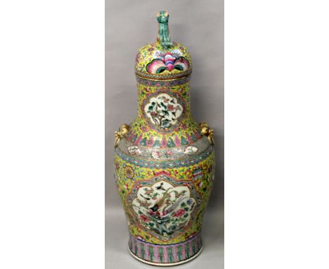 A VERY LARGE & IMPRESSIVE 19TH CENTURY CHINESE YELLOW GROUND FAMILLE ROSE PORCELAIN VASE & COVER, the sides and neck painted 