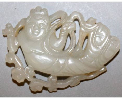 A CHINESE PIERCED PALE CELADON JADE PLAQUE OF A FEMALE IMMORTAL, 1.9in wide & 1.5in high.