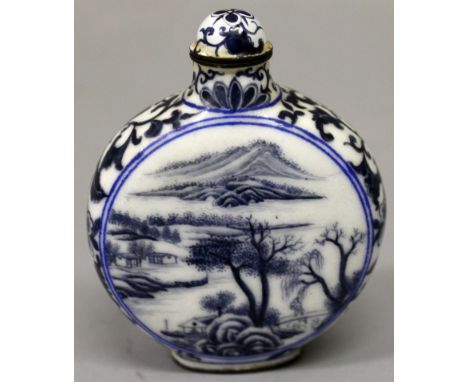 A CANTON ENAMEL SNUFF BOTTLE & STOPPER, decorated in blue with river landscape panels reserved on a white ground, 3in high ov