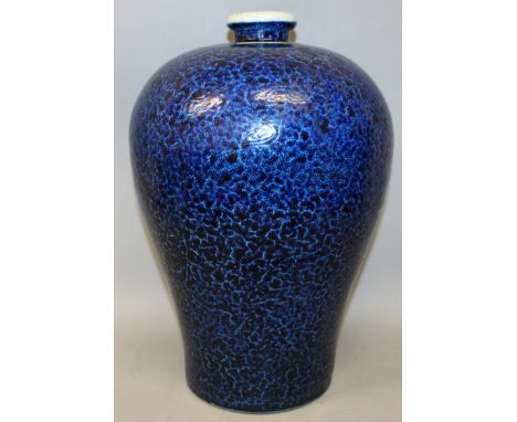 A LARGE CHINESE BLUE GLAZED MEIPING PORCELAIN VASE, the cloud scroll mottled glaze incised with dragons, the base unglazed, t