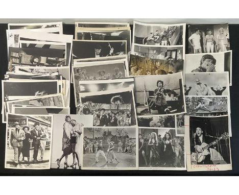 A quantity of music and musicals related, black and white publicity stills to include ROCKY HORROR, GREASE, BOB DYLAN, MIDGE 