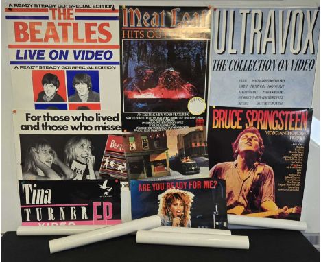 A group of 9 music video shop posters for artists including THE BEATLES, TINA TURNER, BRUCE SPRINGSTEEN, ULTRAVOX, MEAT LOAF,