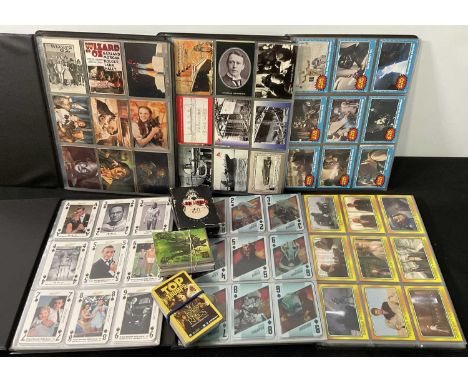 A collection of trading cards from different sets including STAR WARS Heritage Topps trading cards #1-120 (2004), STAR WARS M