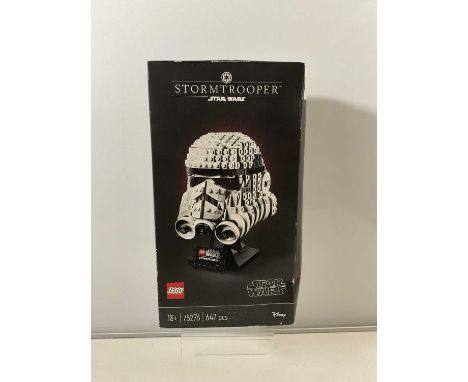 A LEGO STAR WARS Stormtrooper Helmet set 75276. Item factory sealed in original box. The box has crush marks and scuffs to on