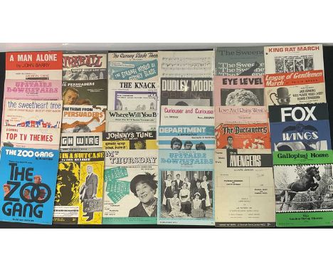 A chorus of sheet music for TV show theme songs including THE AVENGERS, THE PERSUADERS, THE SWEENEY, FIREBALL XL5,:etc… (29)