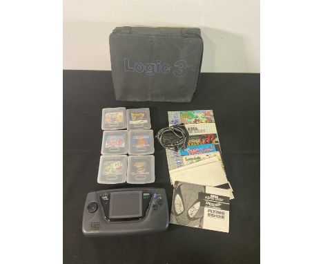 A SEGA GAME GEAR, with 6 games comprising LEMMINGS, SPIDER-MAN RETURN OF THE SINISTER SIX, SEGA GAME PACK, AYRON SENNA’S SUPE