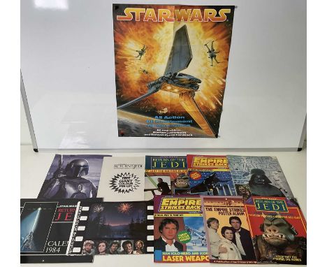 A group of fold-out STAR WARS posters and poster magazines to include the RETURN OF THE JEDI POSTER ALBUM, RETURN OF THE JEDI