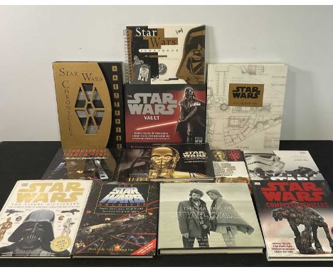 A library of STAR WARS books for the discerning Jedi Scholar to include THE STAR WARS CHRONICLES, THE STAR WARS VAULT - Compl
