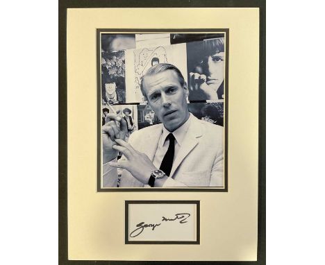 GEORGE MARTIN - A signed display including signature of the legendary Beatles producer, measuring approx 26cm x 40xcm, this i