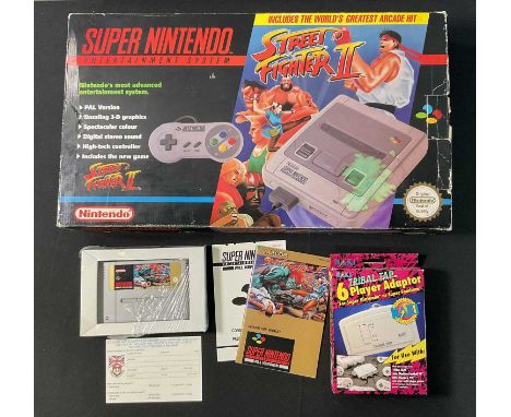 SUPER NINTENDO ENTERTAINMENT SYSTEM Street Fighter II special edition PAL version console, boxed with original inserts and pa