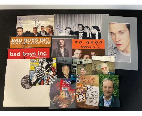A concert of signed photographs and posters from the world of music, this item has been independently checked by Garry King a