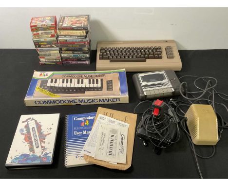 A Commodore 64, collection of 25 games including GHOSTBUSTERS, MAGIK MADNESS, CASTLE OF DREAMS, GHOSTS N GOBLINS, MUTANTS, TH