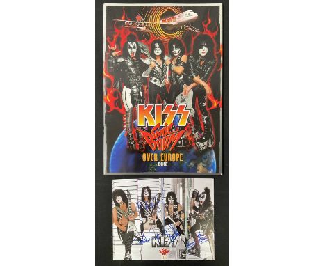A KISS 2010 Sonic Boom tour photo card signed by band members PAUL STANLEY, GENE SIMMONS, ERIC SINGER and TOMMY THAYER, (The 