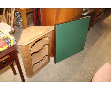 A pine hanging corner unit and a folding card table 