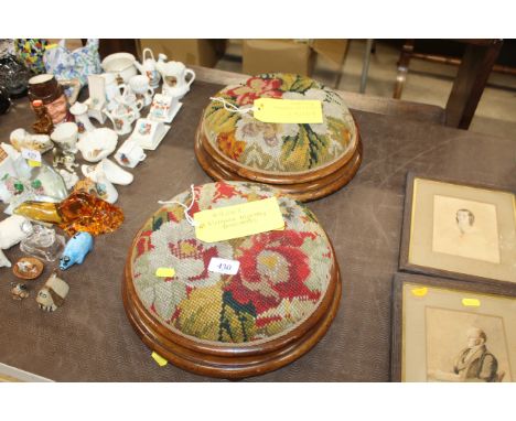 A pair of Victorian tapestry upholstered footstools 