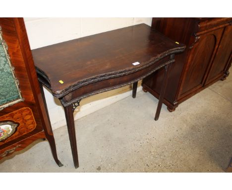 A 19th Century mahogany serpentine fronted card table 