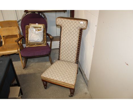 A Victorian rosewood Prie-Dieu chair in Dralon printed tapestry upholstery flanked by spiral turned columns and raised on fro