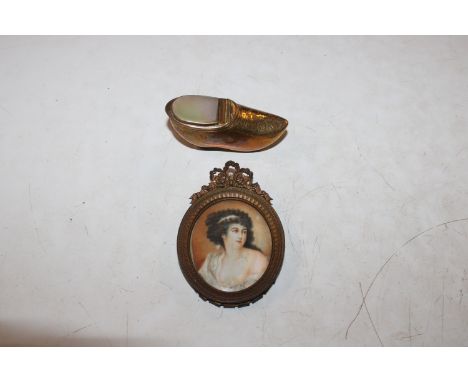 A brass and mother of pearl snuff box in the form of a clog and an oval framed miniature portrait