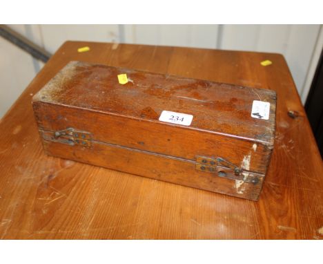 A wooden box and contents of silver plated flatware 