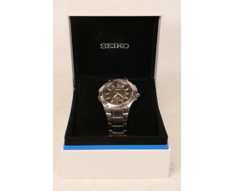 Seiko gents Coutura Kinetic 100 M wrist watch in original box with spare links and instruction manual 