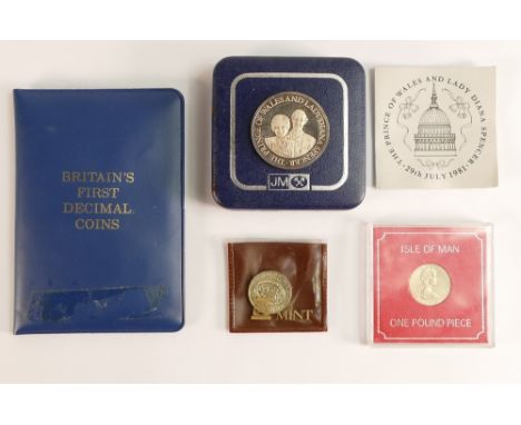 A collection of coins including Silver 1 Ounce commemorative medallion, Britain's first decimal coin set etc 