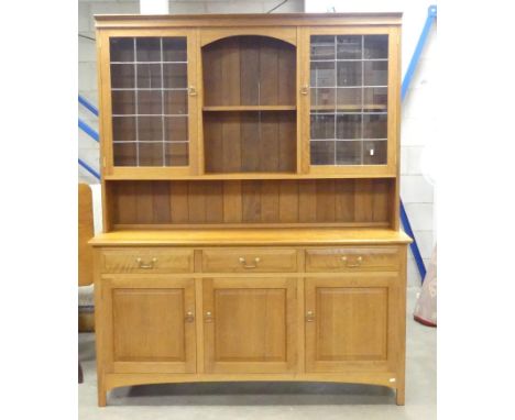 Reynolds of Ludlow large dresser. Three drawers above three cupboards to lower section with central shelf and two glass door 