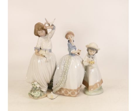 Three Nao Figures to include Girl with a Bird's Nest, Girl Playing with Doves, Girl in Flowing Dress (likely missing parasol)
