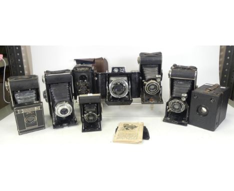 A collection vintage folding cameras to include Agfa Bilinar, Agfa lens Jgestar F7.7, Agfa Agnr 105mm F6.3,Ikonta Zeiss contr