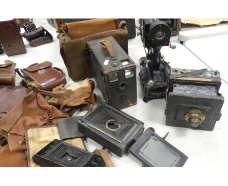 A collection of vintage camera bags, plates, Projector, cameras etc ( 2 trays) 