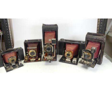 A collection of Kodak and Ray Red Bellow folding vintage cameras to include No2 PHR Brownie model B 1909, No3 Brownie model B