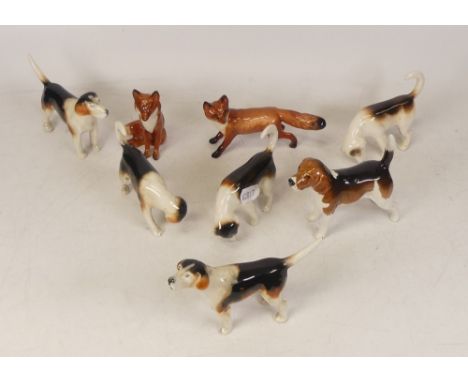 Beswick first version foxhounds to include 941, 942 943, 944x2 together with Beagle 2300, small standing fox and small seated