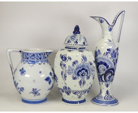 Three Items of Holland Delftware to include a Jug, Ewer and Lidded Temple Jar a/f (3) 