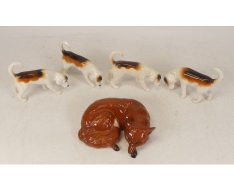 Beswick first version fox hounds to include 944x3, 943 together with a curled fox (5) 