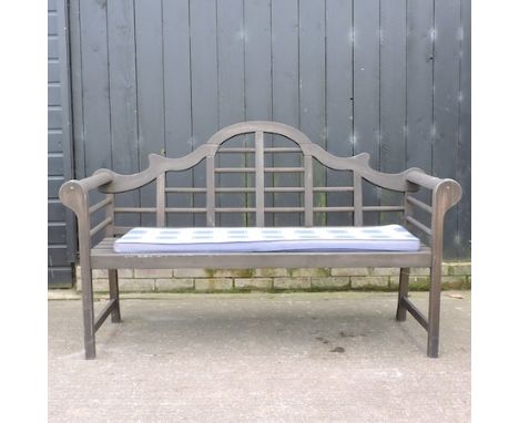 A teak garden bench, 165cm, with cushion