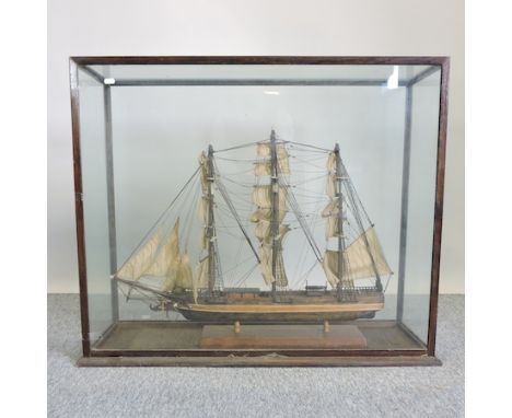 A scale model of a sailing ship, in a glazed case, 93cm